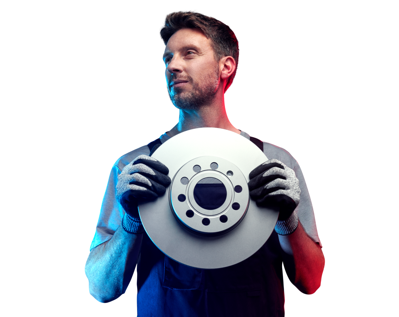 A mechanic holding a vehicle part